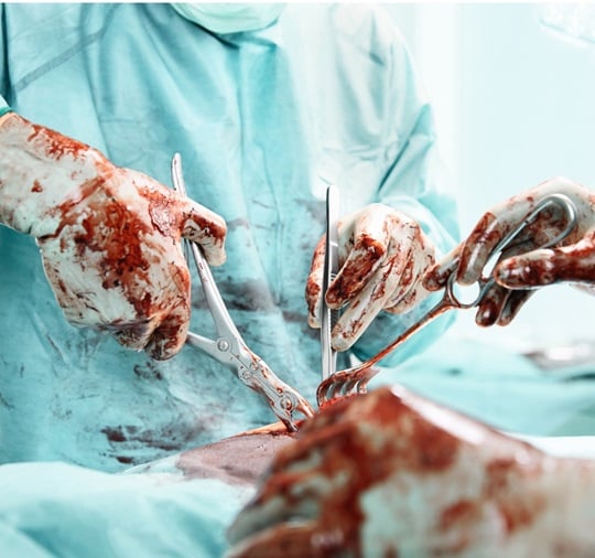 Close-up of two doctors in a surgery.