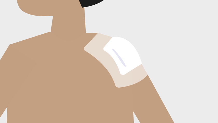 An illustration of a covered wound on a shoulder